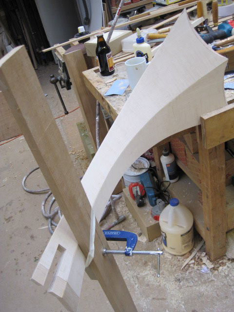 Circular table in ripple Maple veneer with burr Maple edge detail and Mahogany stringing