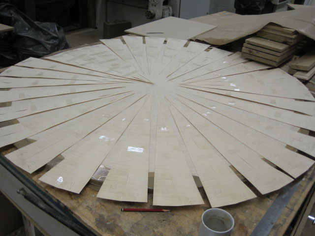 Circular table in ripple Maple veneer with burr Maple edge detail and Mahogany stringing