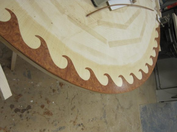 The edge contrasting veneer detail in progress.